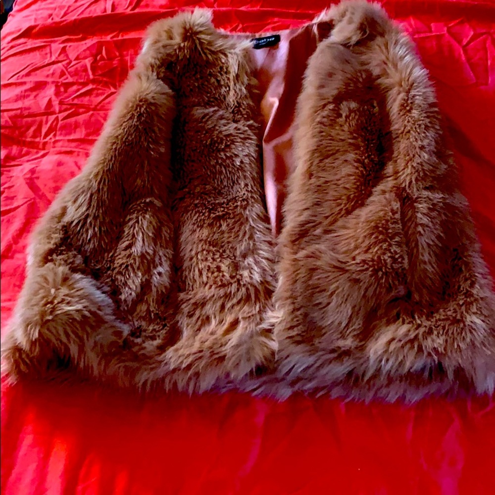 A pink Bebe vest